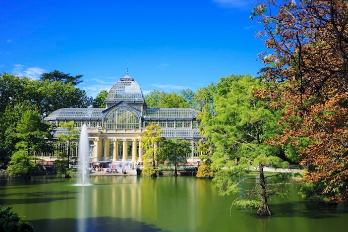 Crystal Palace Gardens in a sunny day in Madrid.