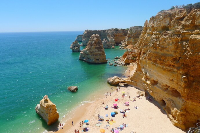 10 - Marvel at the golden and azure hues in Marinha Beach, Algarve
