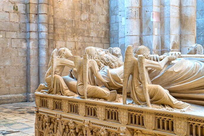 Elaborately carved stone tomb of King Pedro I inside Alcobaça Monastery Church in Alcobaça, Portugal.