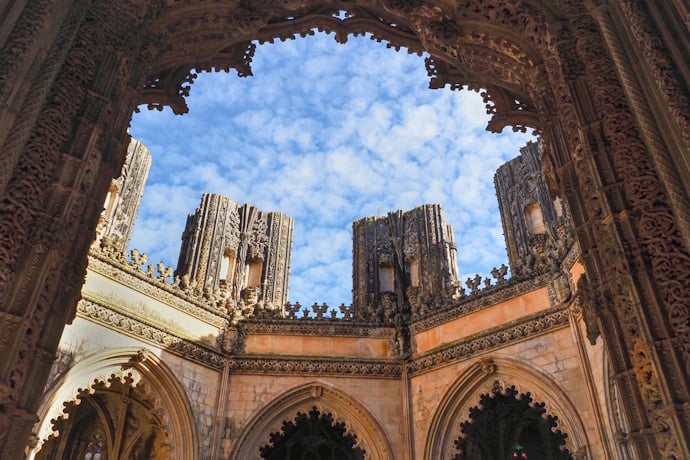 Open-air Gothic architecture of the Unfinished Chapels at Batalha Monastery.
