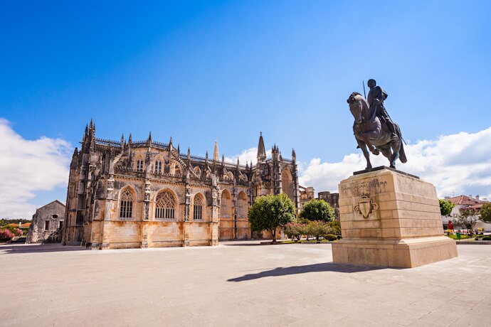 Batalha Monastery and the equestrian statue of Nuno Álvares Pereira in Batalha, Portugal.