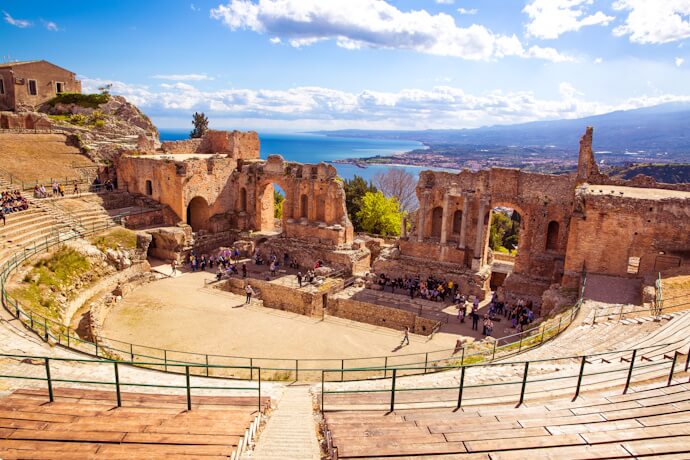 The ancient Greco-Roman theatre in Taormina, overlooking the stunning Sicilian coastline