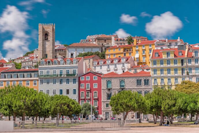 Colorful Alfama rooftops and Lisbon Cathedral seen from the riverside area of Lisbon