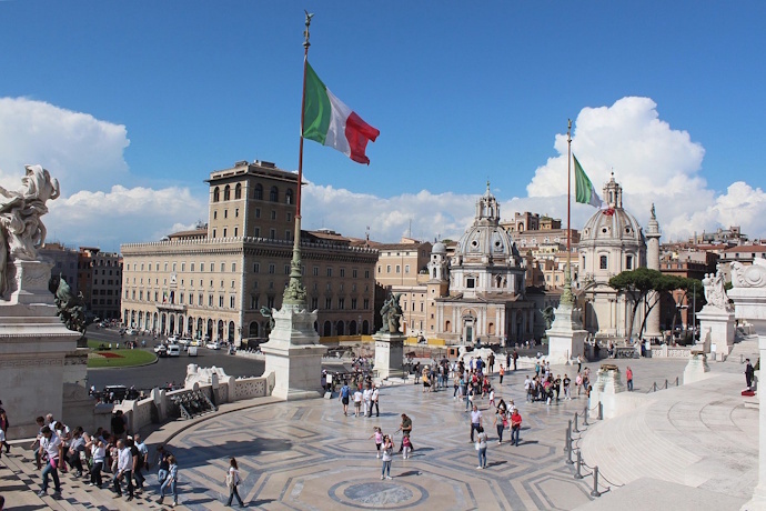 View from Vittorio Emanuele Monument, with Italian flags, in Rome, Italy
