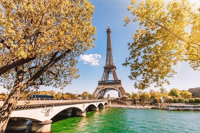 The Eiffel Tower in a sunny day in Paris.