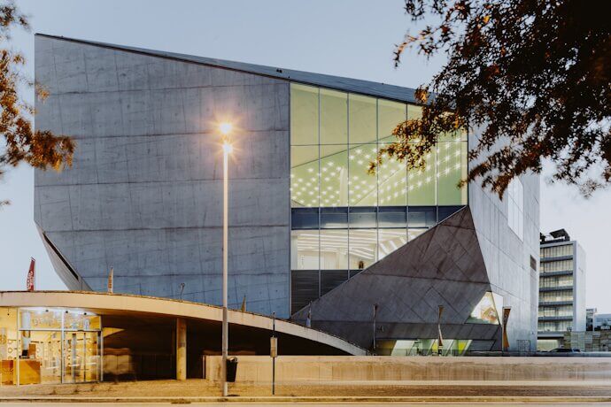 View of Casa da Música at sunset, a modern landmark known for its cultural value in the city of Porto