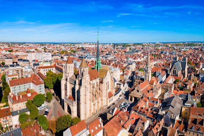 Aerial view of Dijon rooftops and historic church towers