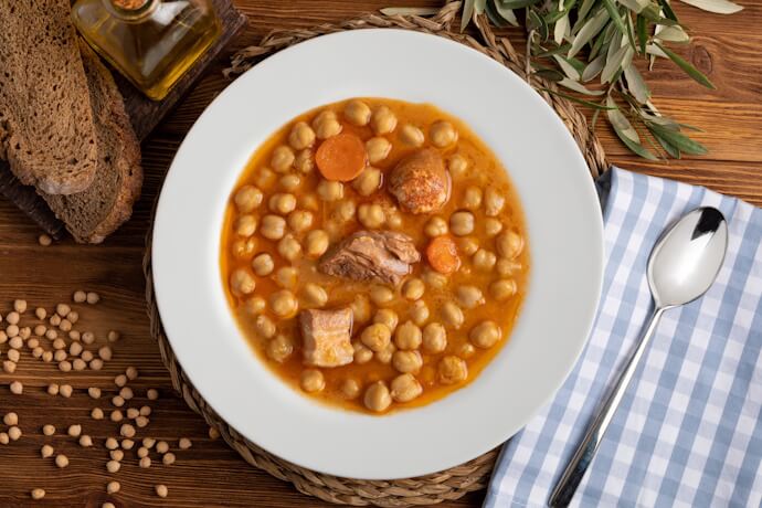 Traditional Cocido Madrileño chickpea stew with meats and vegetables, a classic dish from Madrid