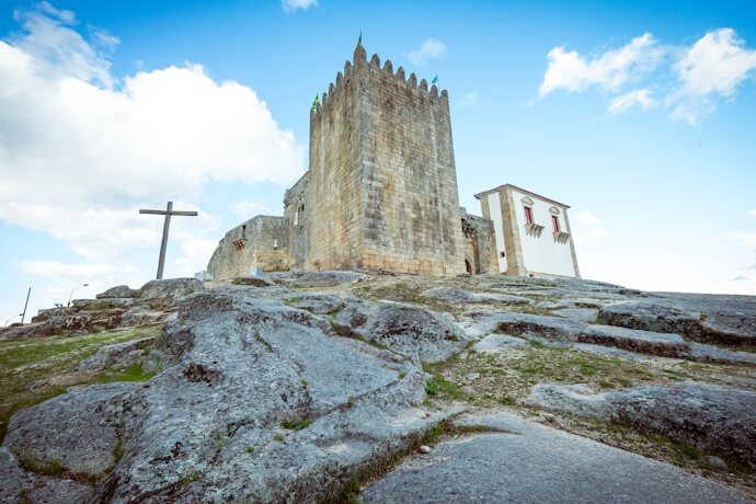 The medieval keep of Belmonte Castle rising above its granite hilltop, Portugal.
