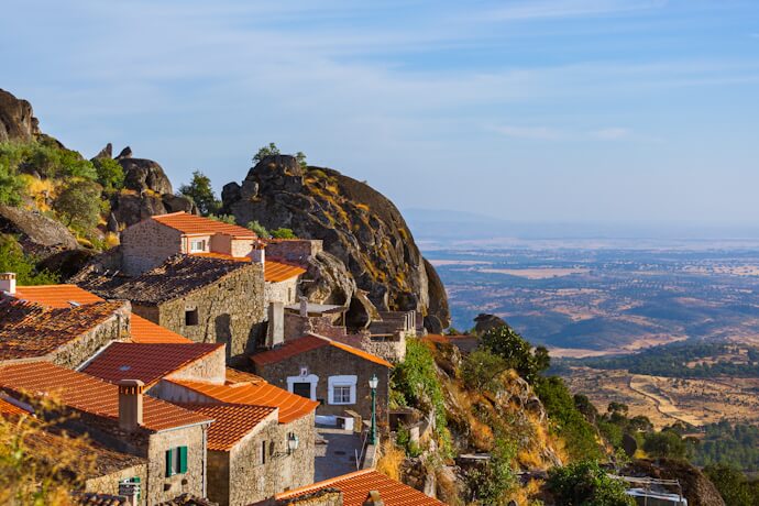 Panoramic view from Monsanto across granite houses and the surrounding countryside, Portugal.