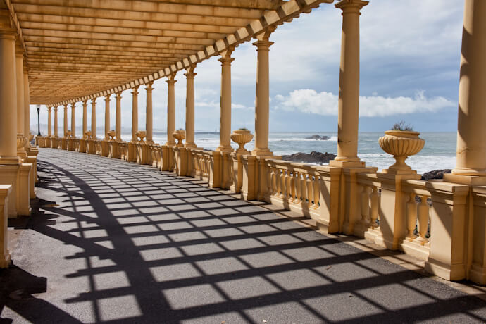 Seafront promenade with colonnades along the Atlantic coast in Foz do Douro
