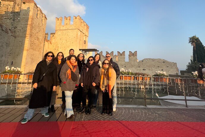 Group photo with Scaligero Castle in the background