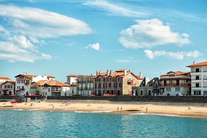 People at a beach in the seaside town of Saint-Jean-de-Luz
