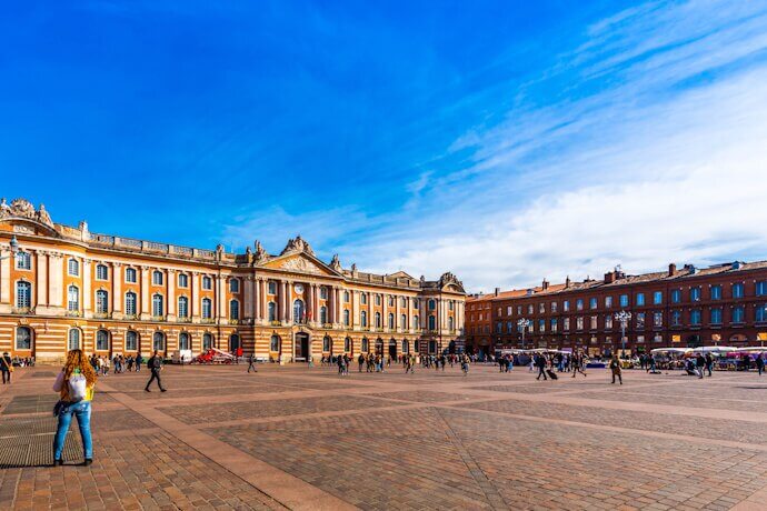 People in Toulouse's Capitole square