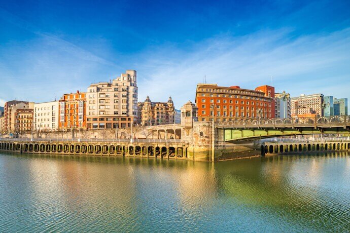Cityscape of Bilbao reflected in the water, Basque Country