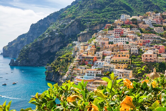 Amalfi Coast cliffside village overlooking the Mediterranean Sea, colorful summer scenery in Italy