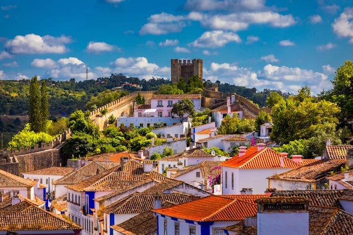 Whitewashed houses and medieval walls of Óbidos.
