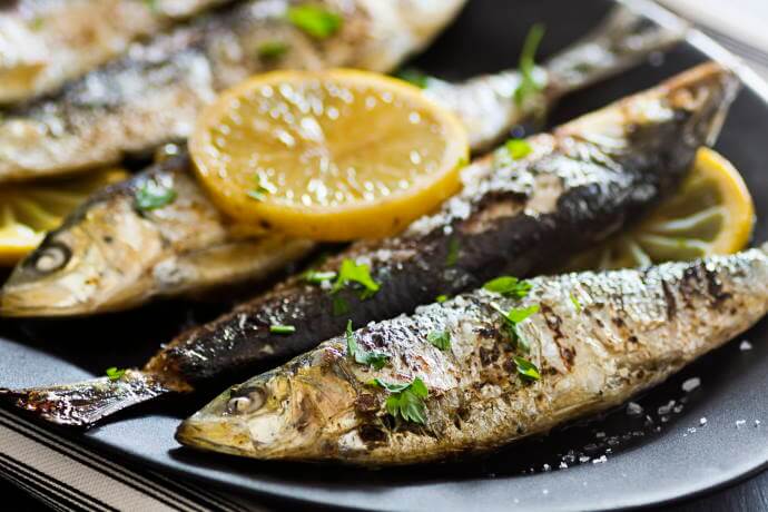 Enjoy grilled fish with a sea view