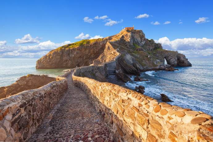 Gaztelugatxe islet, connected to the mainland by a man-made bridge