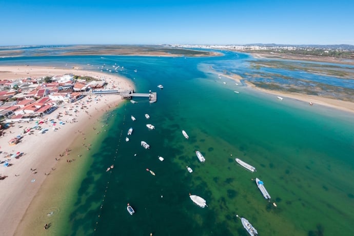 Cruising through the channels of Ria Formosa, at Armona Island.