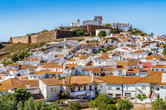 Cityscape of the historic city of Estremoz with castle on top