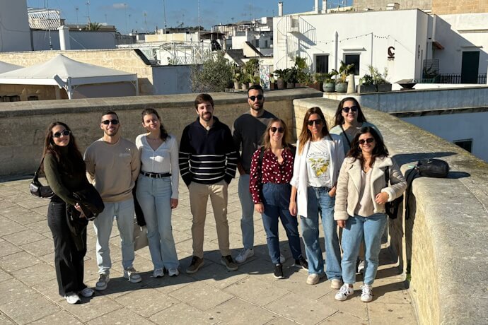 TourTailors team group photo in Otranto, Italy, taken during a work trip along the Adriatic coast.