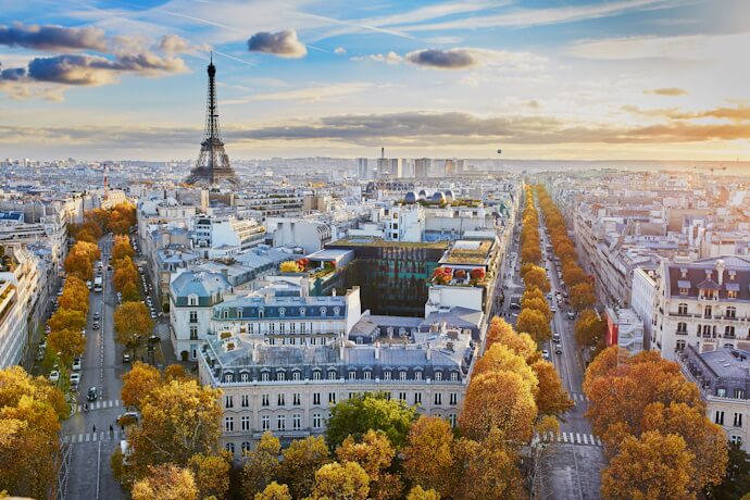 Aerial view of the Eiffel Tower in France and Paris cityscape with autumn colors along the Champ de Mars