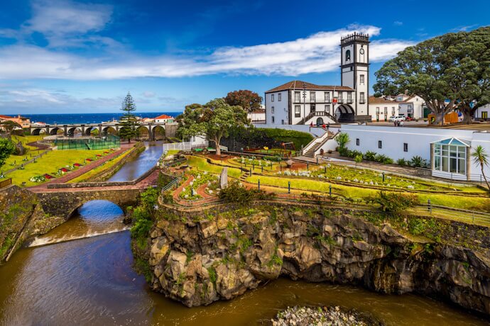 Ribeira Grande in São Miguel, Azores, with historic architecture, gardens, bridges, and the river near the town center.