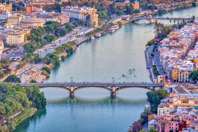 Aerial view of Triana and San Telmo Bridge in Seville, Spain