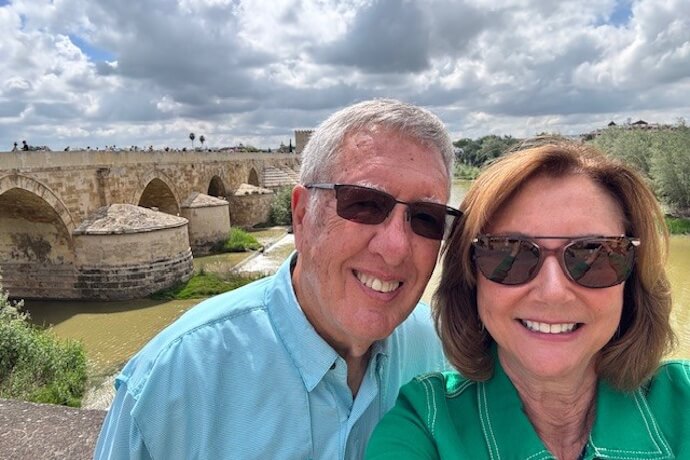 Senior Couple posing by a bridge in Cordoba