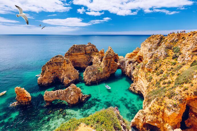 Stunning cliffs and turquoise waters at Ponta da Piedade, Algarve, Portugal.
