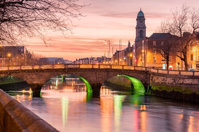 O'Connell Bridge crossing the River Liffey at sunset in Dublin, Ireland.