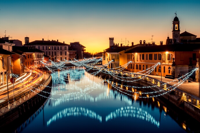 Navigli canal decorated with festive lights in Milan