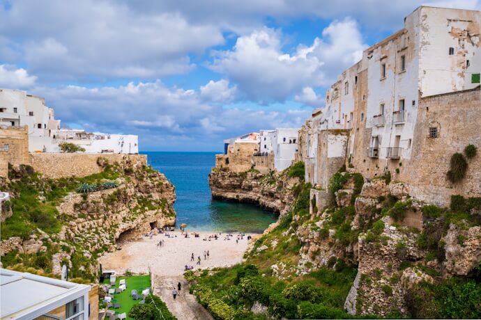 Polignano a Mare beach between cliffs in Puglia