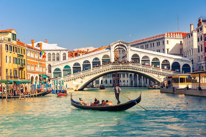 Gondola on the Grand Canal near Rialto Bridge in Venice