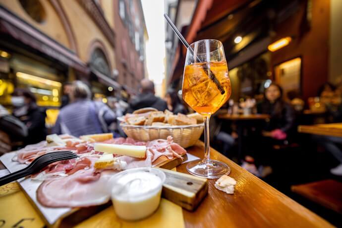 Aperitivo with cured meats and an Aperol Spritz in Bologna