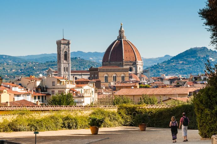 Travelers viewing Florence Cathedral from the gardens