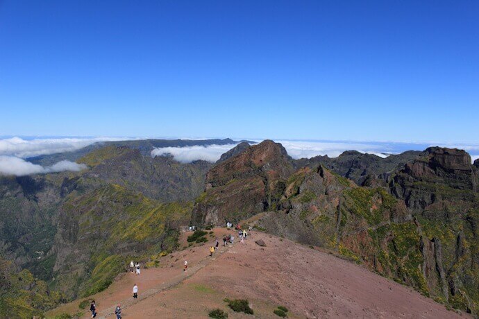 People hiking in Pico do Arieiro, Madeira Island
