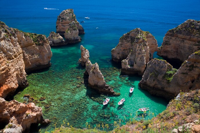 Turquoise waters and sea stacks at Ponta da Piedade, Lagos, Algarve.