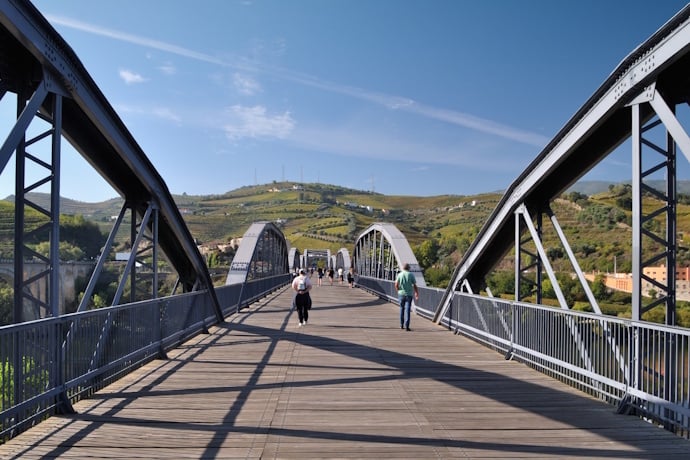 People crossing the pedestrian bridge in Peso da Régua, Douro Valley