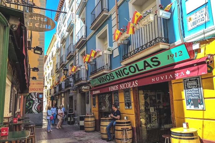 People walking the streets in the El Tubo district, in Zaragoza