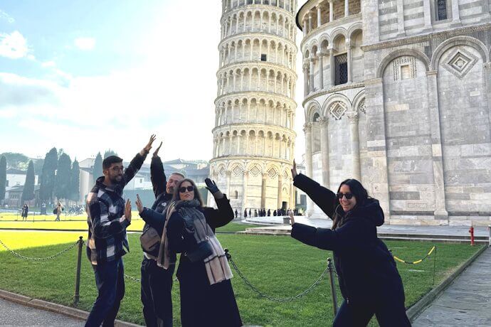 Group photo with the Leaning Tower of Pisa