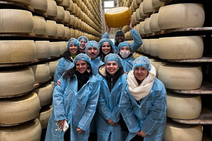 Group tour in a Parmigiano cheese factory