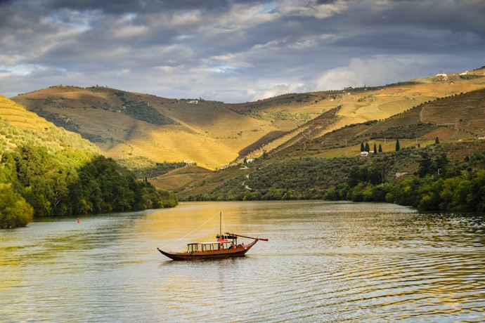Boat tour among vineyards in the Douro Valley, Portugal