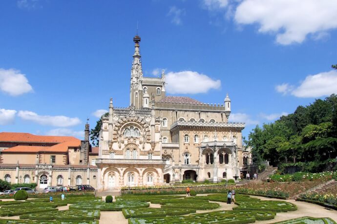 Romantic Palace Hotel of Bussaco surrounded by gardens in Luso, Portugal
