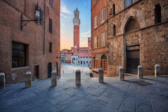 Piazza del Campo and the Torre del Mangia in Siena, Tuscany, Italy.