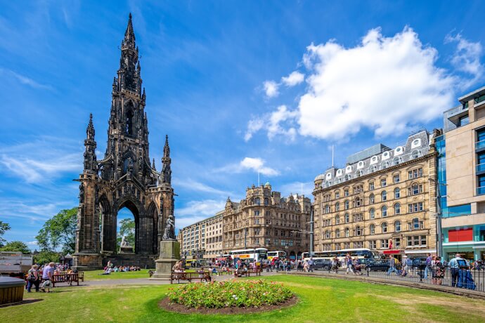 Scott Monument and Princes Street Gardens in Edinburgh on a sunny day