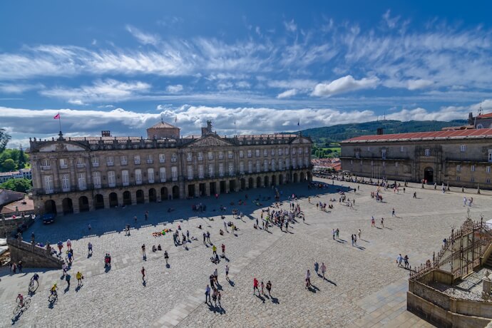 Cathedral Square (Praza do Obradoiro) in Santiago de Compostela with pilgrims and visitors in front of the cathedral.