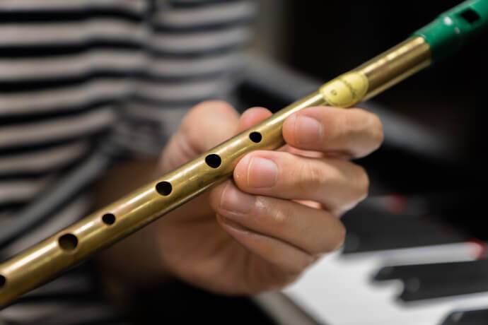 The traditional Irish flute being played during a live music session, a cornerstone of Galway’s rich cultural heritage.
