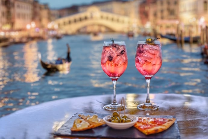 Aperitivo overlooking the Grand Canal near Rialto Bridge, in San Polo neighborhood, Venice